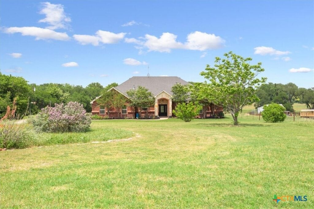 Welcome to this meticulously maintained custom, one-owner home situated just two miles east of I-35 in the desirable Troy ISD