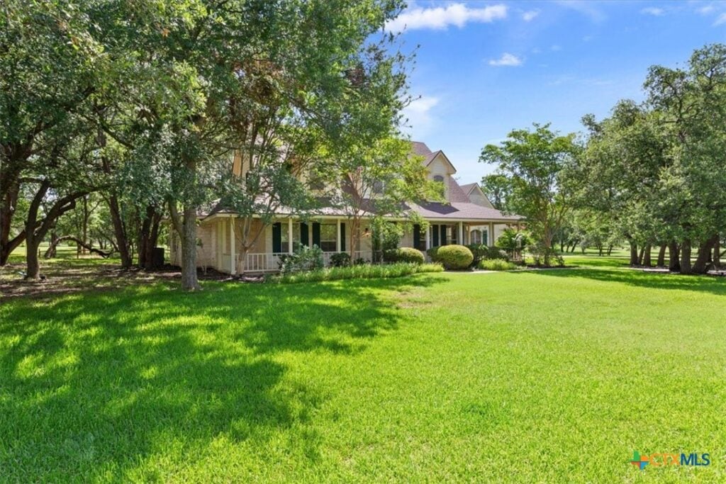 Nestled just outside the city limits, this beautifully maintained 4-bedroom, 4-bath home sits on a private, wooded 2-acre lot in the highly sought-after Salado ISD
