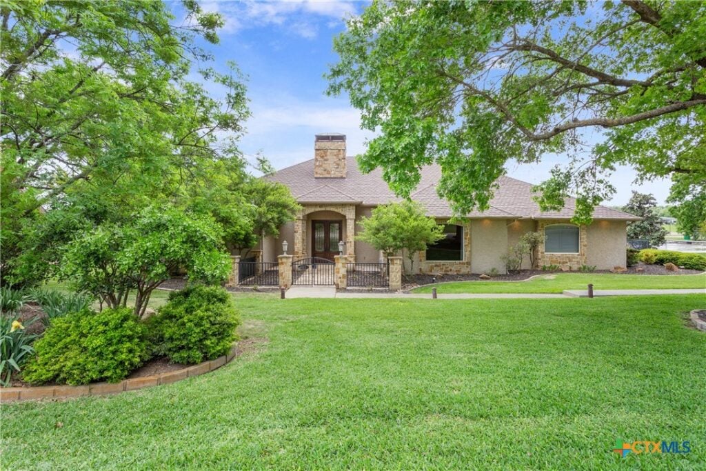 Four bedroom/four bath home with a game room overlooks Mill Creek Golf Course and Salado Creek.  Enjoy the views from the covered back porch, in-ground swimming pool and hot tub, or fenced back yard