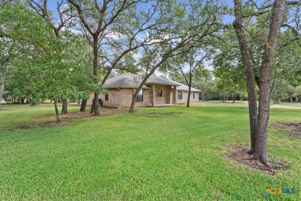 Welcome to your dream home! This beautifully updated 3-bedroom, 2-bath residence is nestled on a wooded